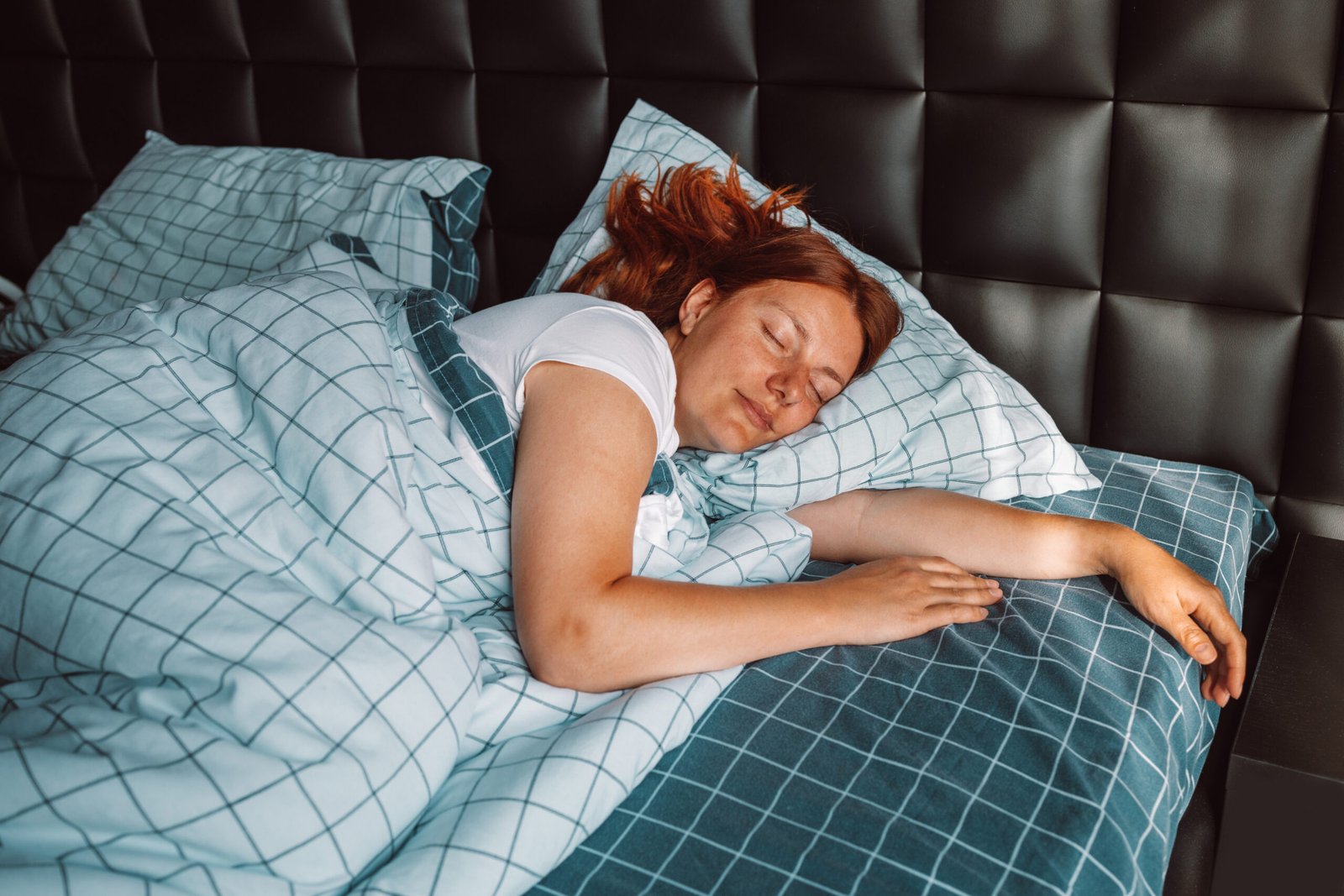 woman sleeping peacefully in bed
