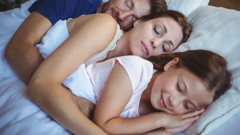 A family asleep together